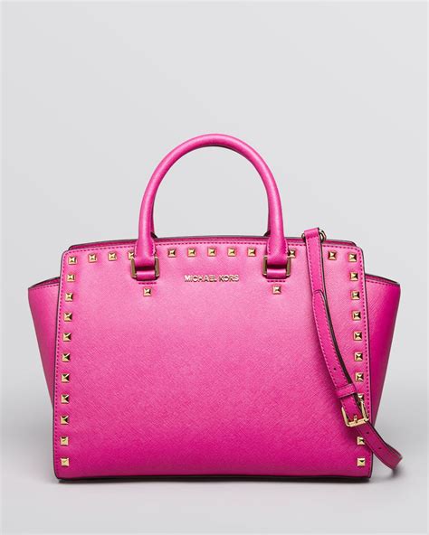 michael kors rochelle satchel pink|Michael Kors pink studded purse.